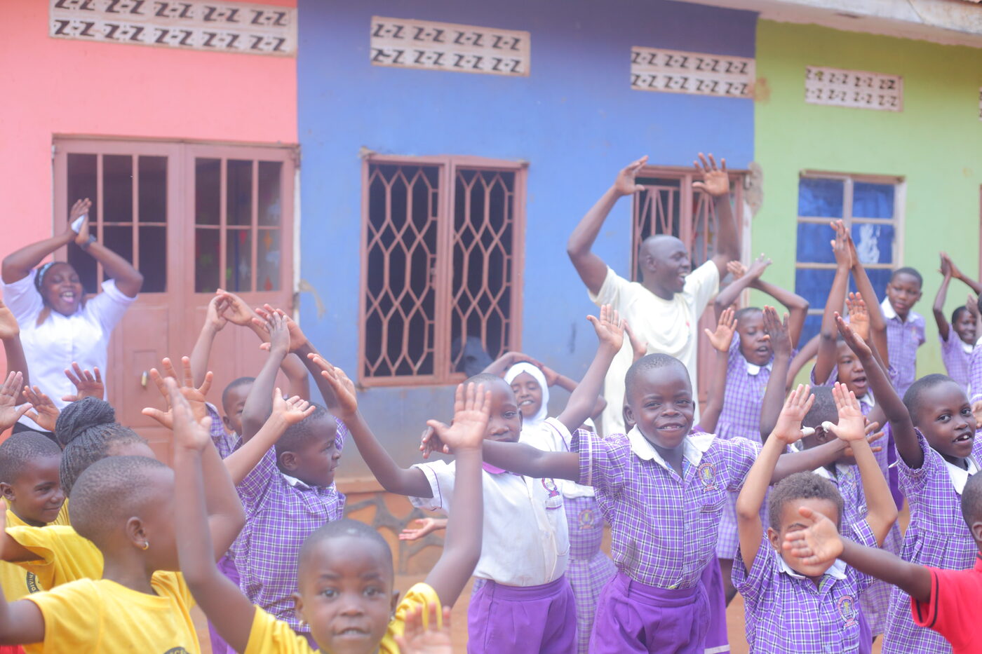Students celebrating education at Divine Nursery and Primary School